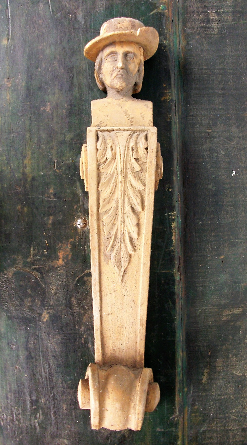 Man with Hat Carving in wood